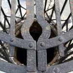 grille de puits en fer forgé